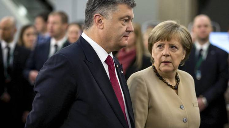 Порошенко просит Меркель спасти Украину еще раз