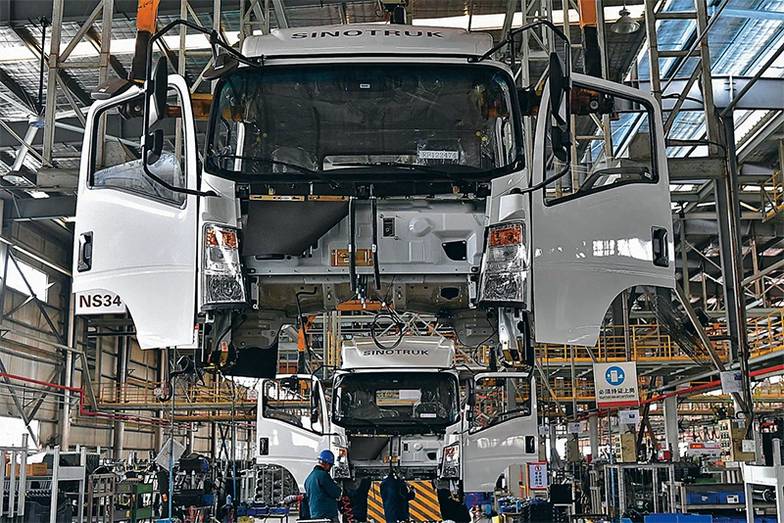HANG BIN/CHINA NEWS SERVICE/VCG Марка грузовых автомобилей Sitrak (принадлежит китайскому производителю Sinotruk Group) по продажам в России уже почти догнала российский КамАЗ