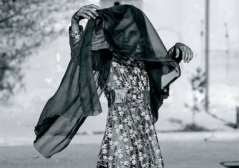 ADAM ROUNTREE - ZUMA EXCLUSIVE\TASS Афганская девочка на улице Кандагара (10 августа 2021 года)