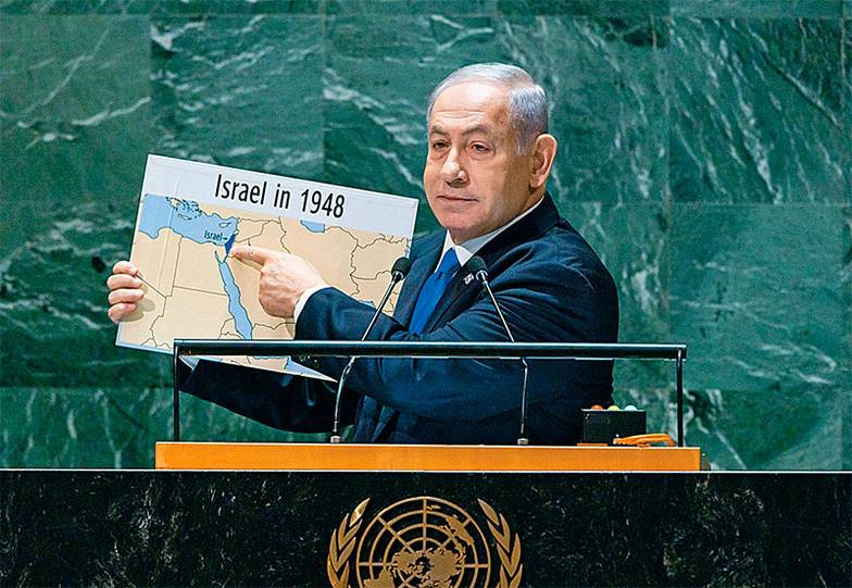 EPA Премьер-министр Израиля Биньямин Нетаньяху во время выступления на 78-й сессии Генеральной Ассамблеи ООН в 2023 году