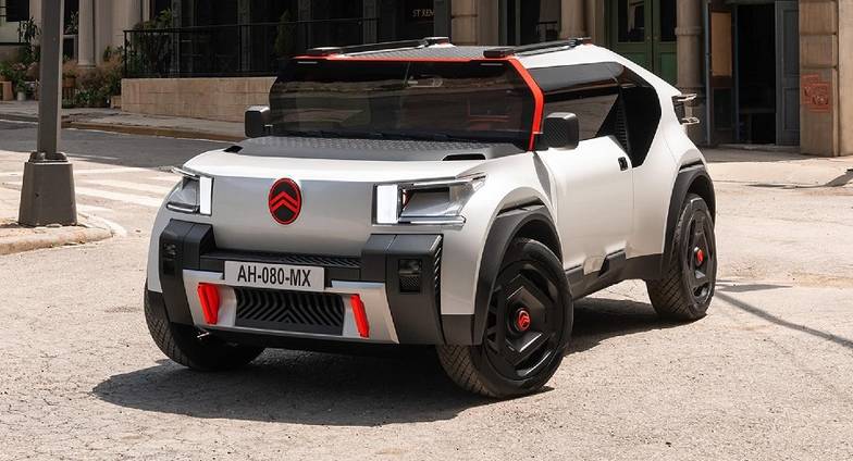  Citroen Oli — концепт семейного авто эпохи бережливости. Минимальные батарея и электромотор, срок службы не менее 10 лет, трансформируемый кузов (из хэтчбека в пикап), легкосменные на случай аварии пластиковые панели и «донорство» битых машин для ремонта. И да, обратите внимание на простые, практически 2D, поверхности — и их пересечение для «разбивания» монотонности боковин