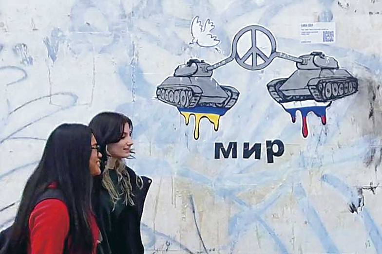 ЛИПЕНКОВА СОФЬЯ/ТАСС Уличное искусство в Италии миролюбиво