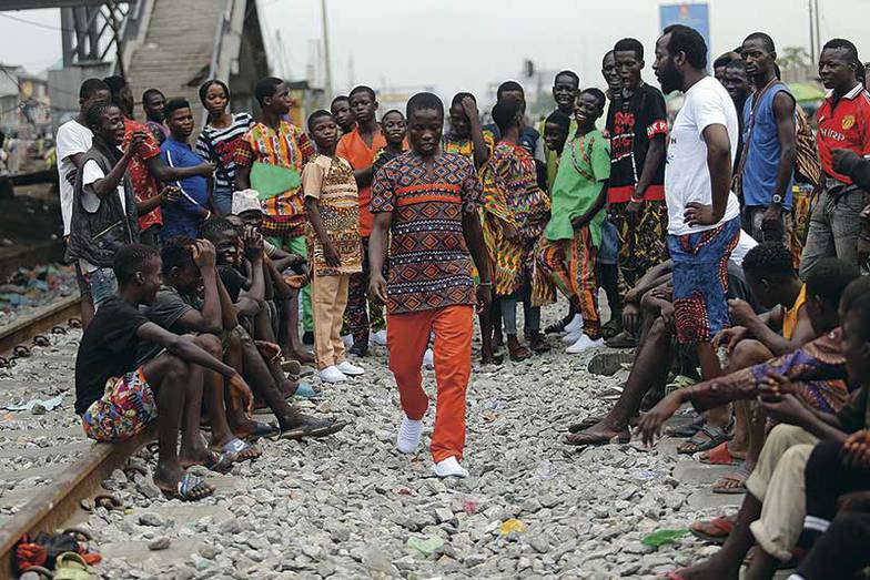 PA/AKINTUNDE AKINLEYE В Нигерии все больше численность среднего класса, но Африка все равно в этом веке не догонит по мощности Индию